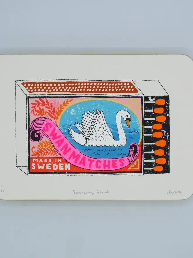 Swan Vintage Matchbox Screenprint Swanning About, a colourful swan matchbox design in the centre of a white card. 