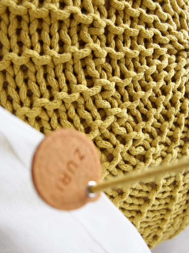 golden kiwi knitted pouffe