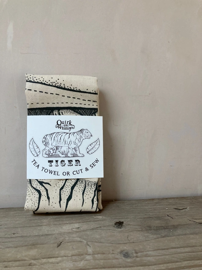 folded tiger tea towel in wrapper