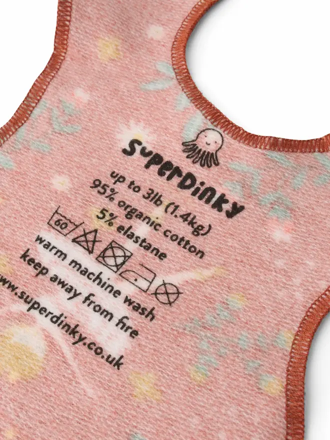inside of preemie baby vest showing flat print organic cotton 