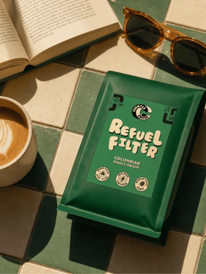 Refuel Filter. A bag of coffee beans from Counter Coffee.