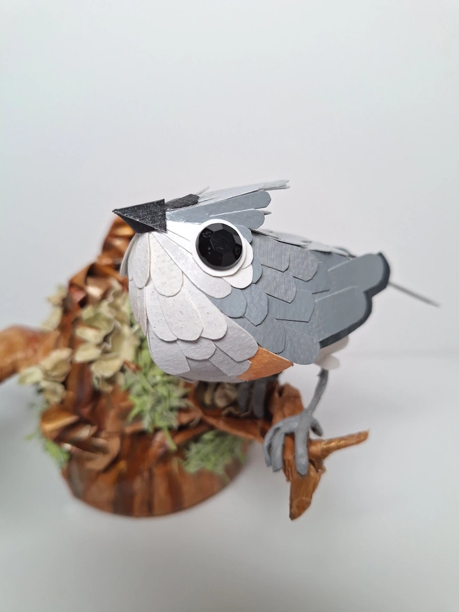 Tufted Titmice on a trees tump handmade bird sculpture