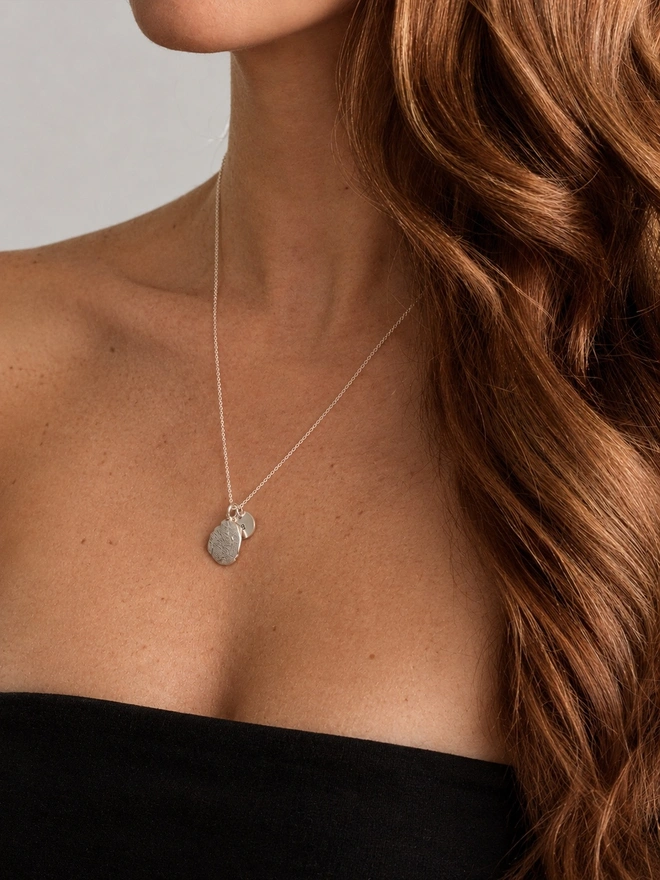 Dog paw and nose print kits, to make a recycled sterling silver pendant necklace of your dog. Perfect gift to remember your fur baby, or a perfect present for the dog obsessed. Made by Celina C Jewellery, a small business in the UK, find on Holly and Co.