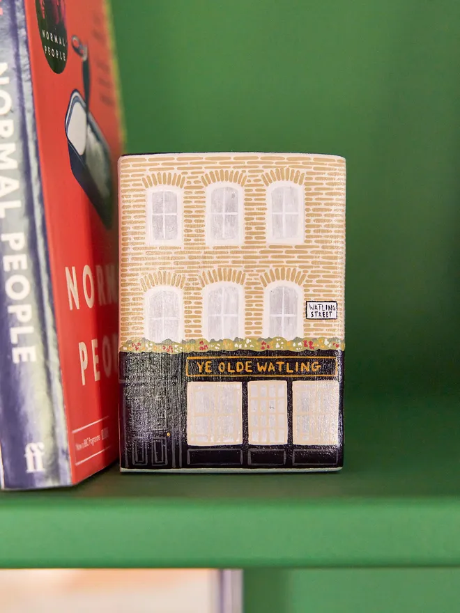 handmade ceramic sculpture in design of a pub