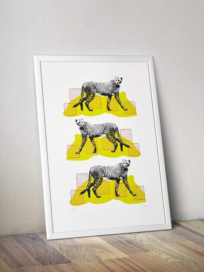 A Coalition of Cheetahs - Screen Printed Poster - mock up in a frame