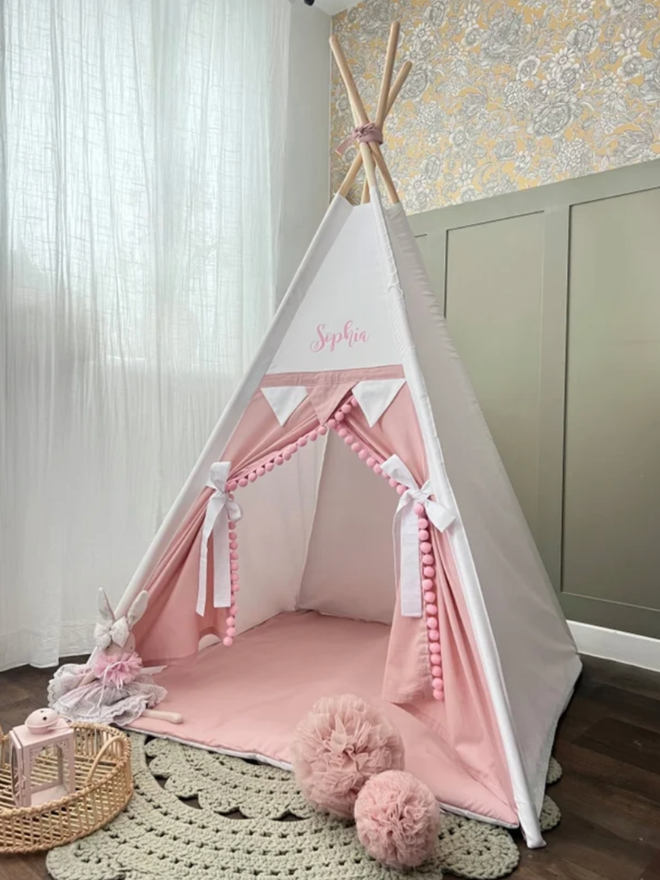 White & Dusty Pink Teepee. A pink and white teepee.