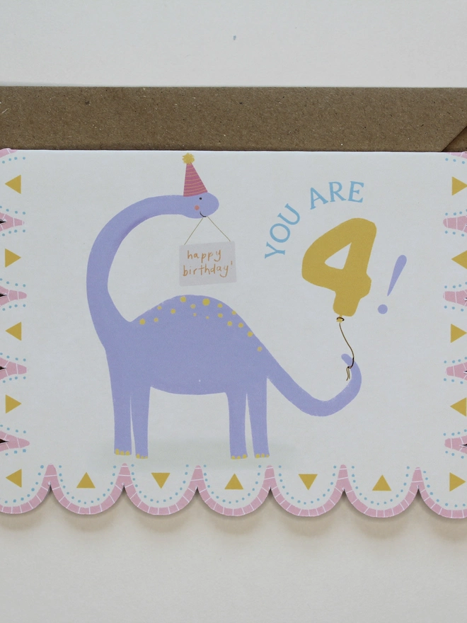 illustrated dinosaur 4th birthday card. scallop edged card 