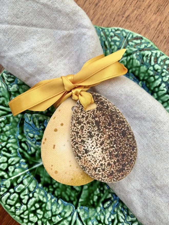 speckled eggs with gold ribbon