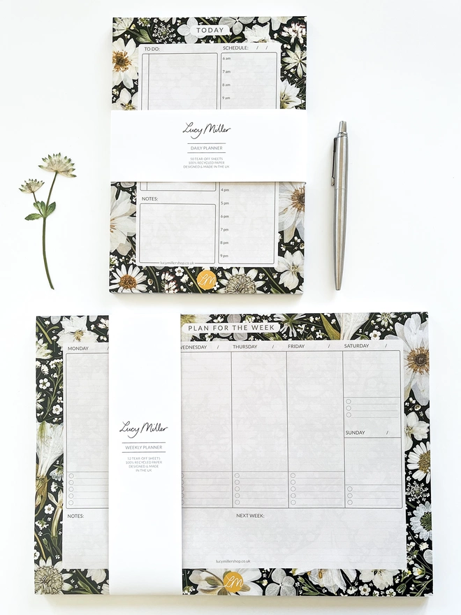 Matching pressed flower daily and weekly planner pads, perfect for scheduling the day and the week, bringing a touch of nature to the indoors