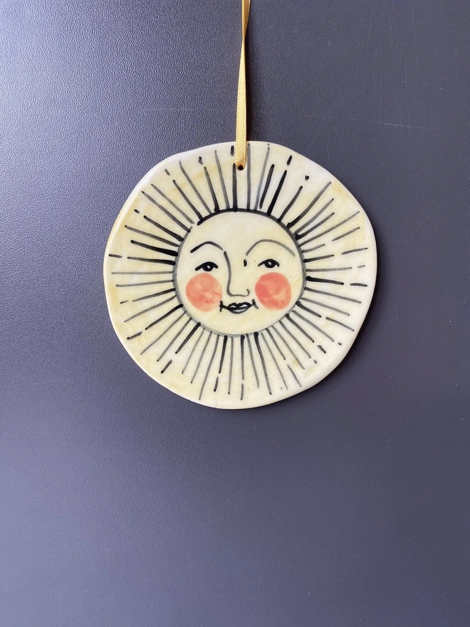Hand-Painted Porcelain Sun Hanging Decoration
