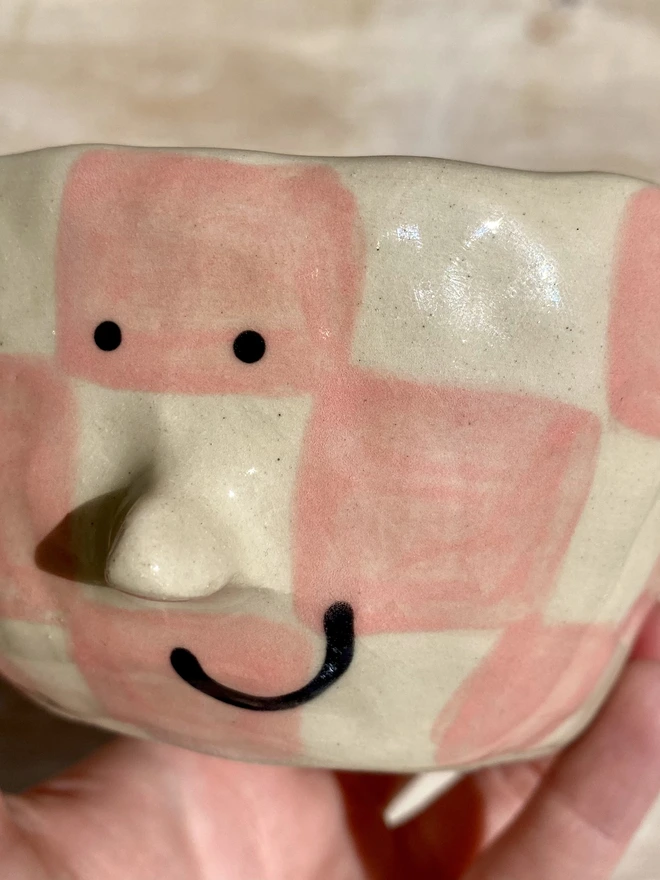 rose checkerboard ceramic pot - close up
