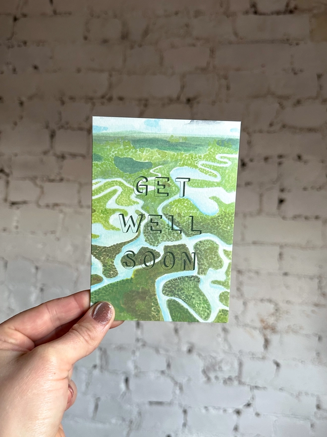 a greetings card featuring an illustration of the Everglades National Park with the text “GET WELL SOON”