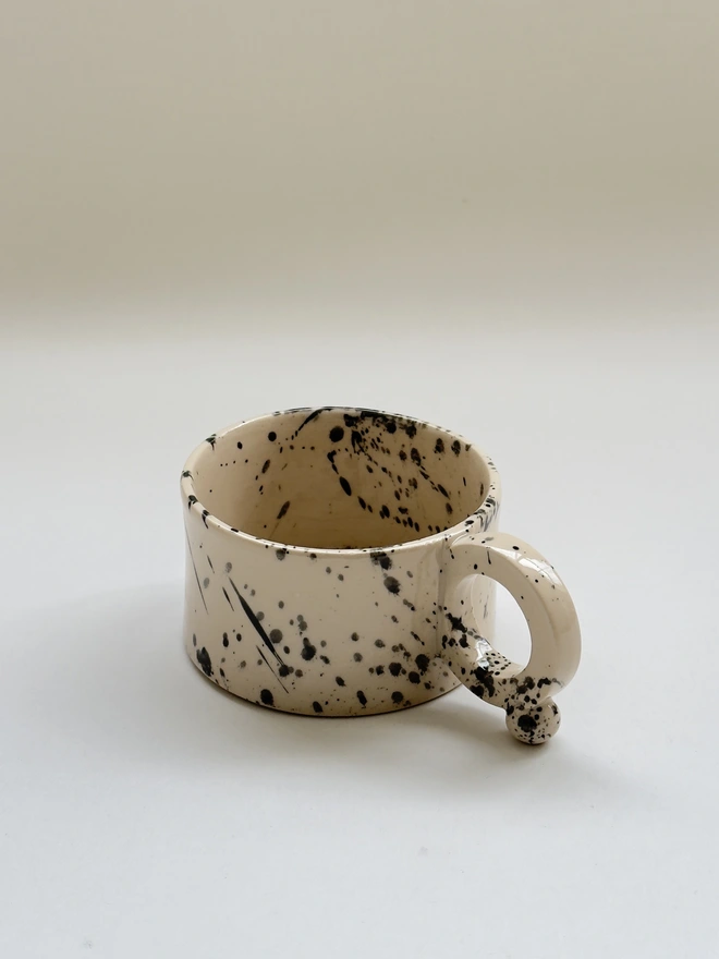 Black speckled modern ceramic mug