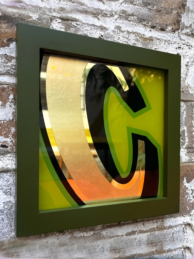 Gold leaf letters framed