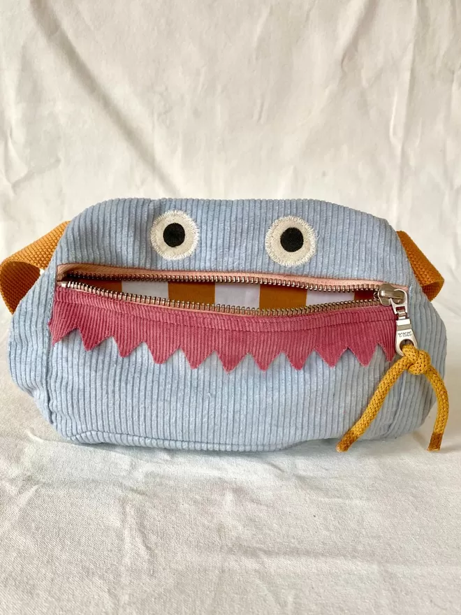 childrens pouch bum bag monster design in blue corduroy