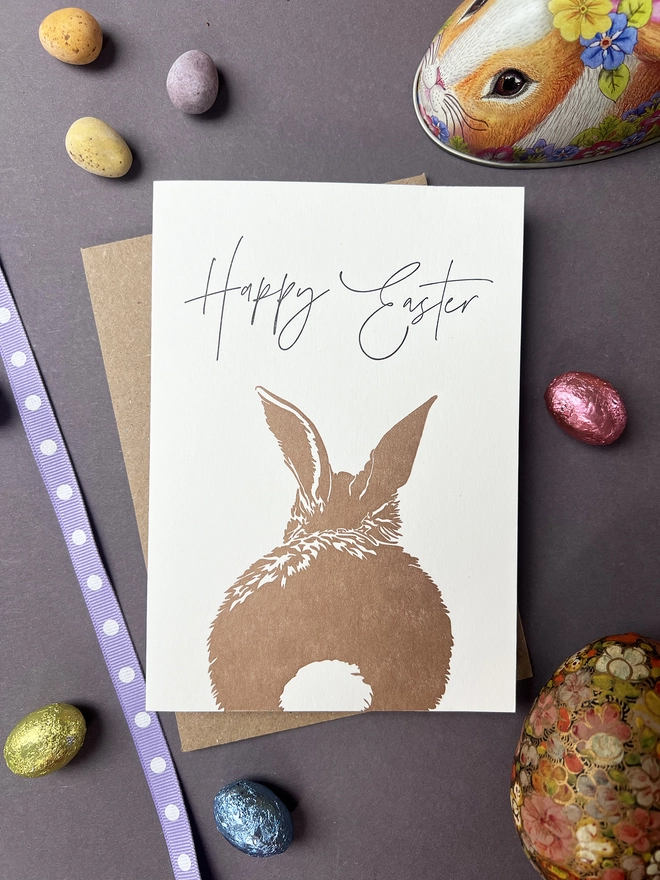 The Bunny card with easter decorations laid out around it.