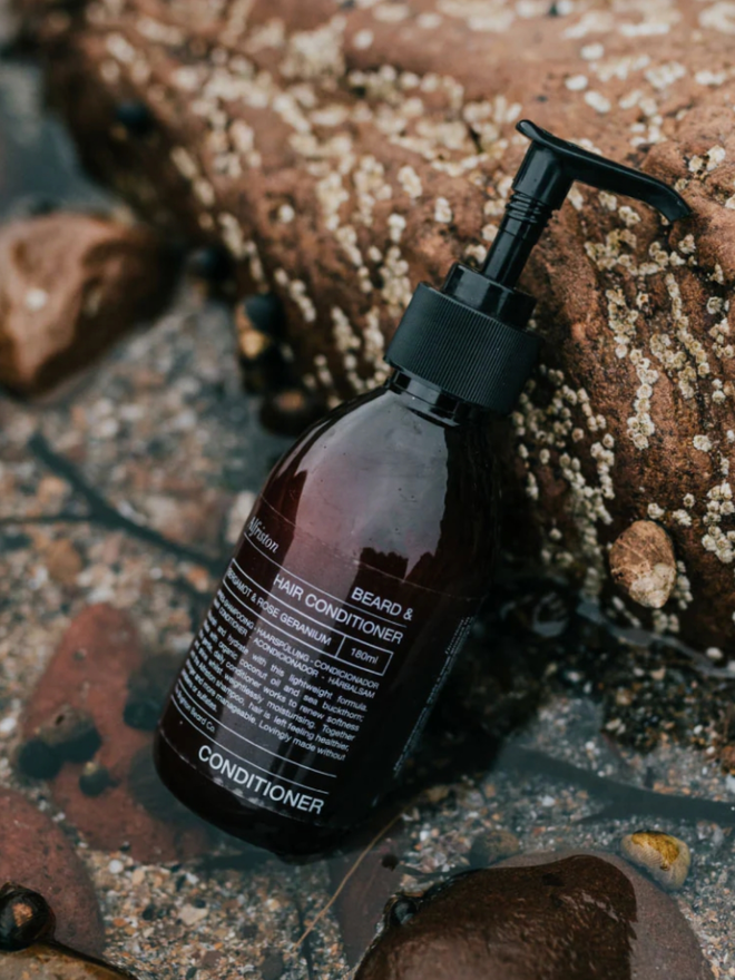 Alfriston Beard & Hair Conditioner. A brown bottle of conditioner.