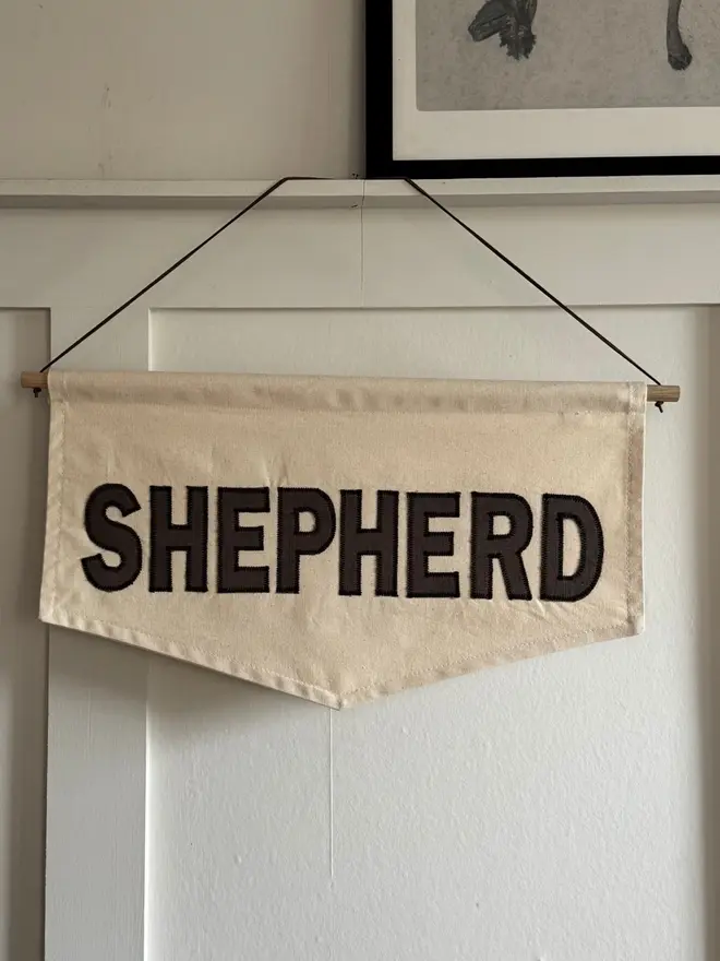 Linen Name Banner.  A banner with the word SHEPHERD in soft brown linen