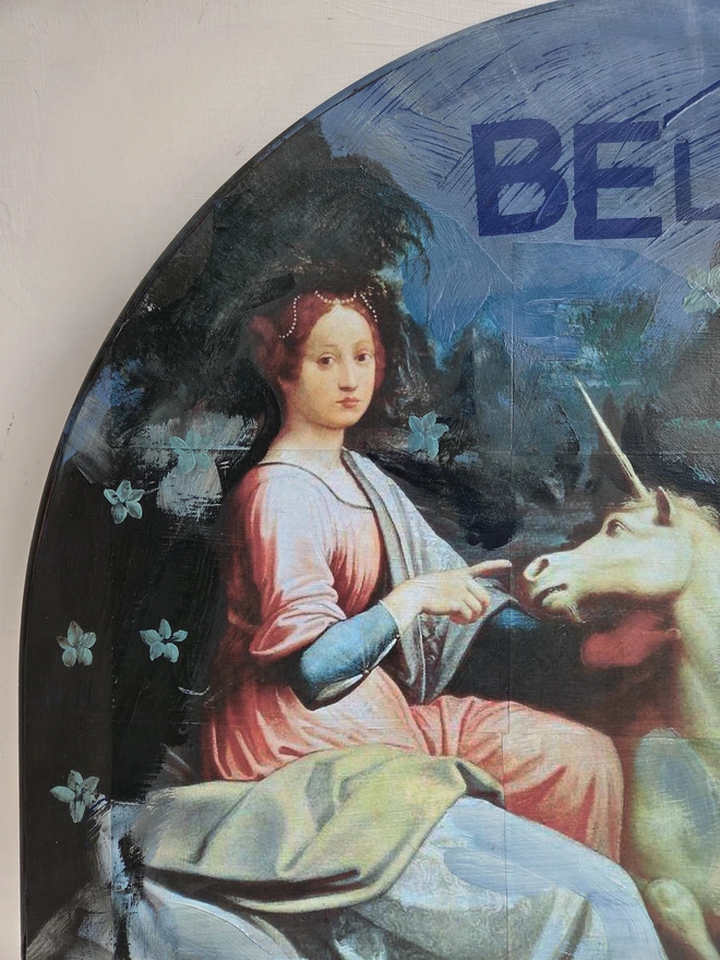 Unicorn art panel made from an upcycled table-top.