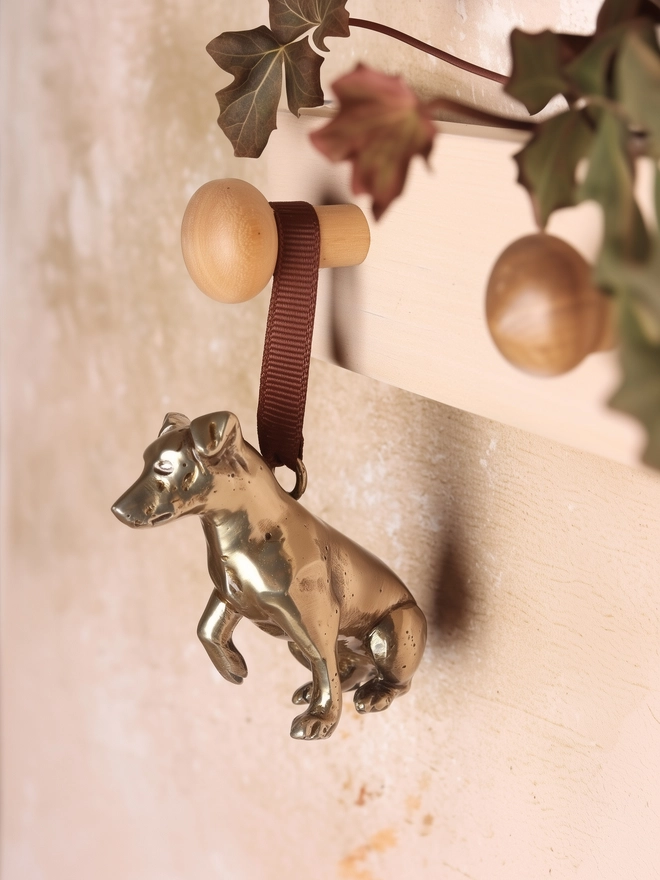 Jack Russell christmas tree decoration hanging on peg