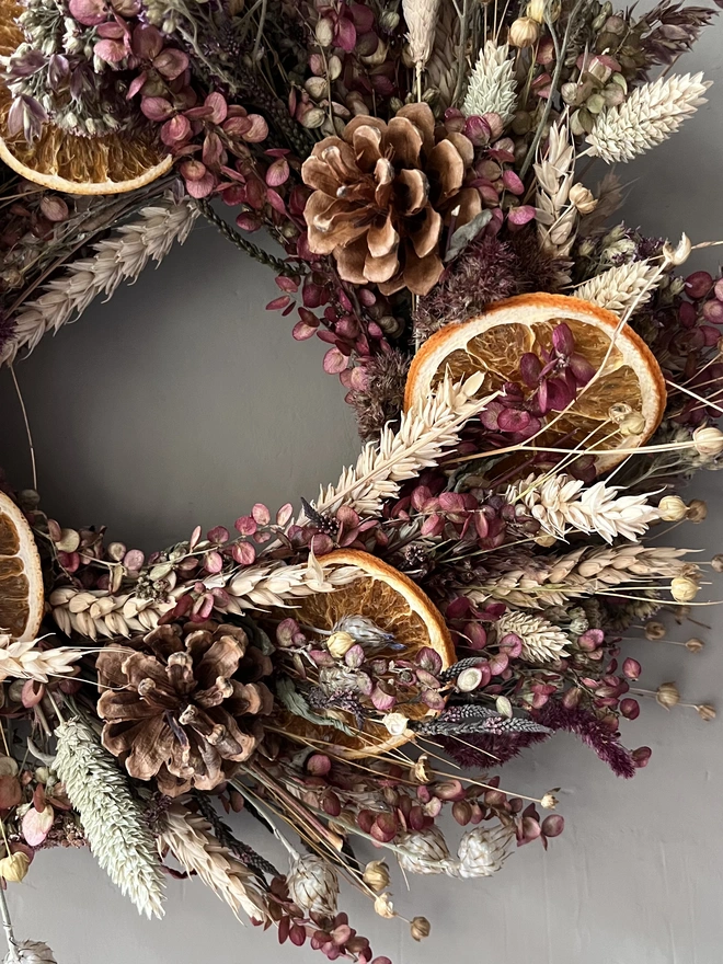 Cosy Winter wreath hanging on wall 