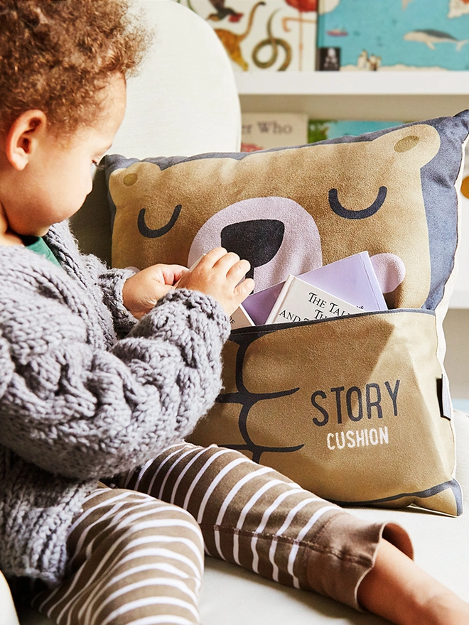 drifting bear story time pocket cushion bear