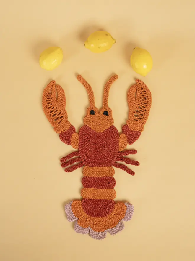 orange and red lobster hand woven jute placemat 