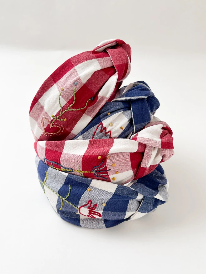 A pile of hand embroidered headbands