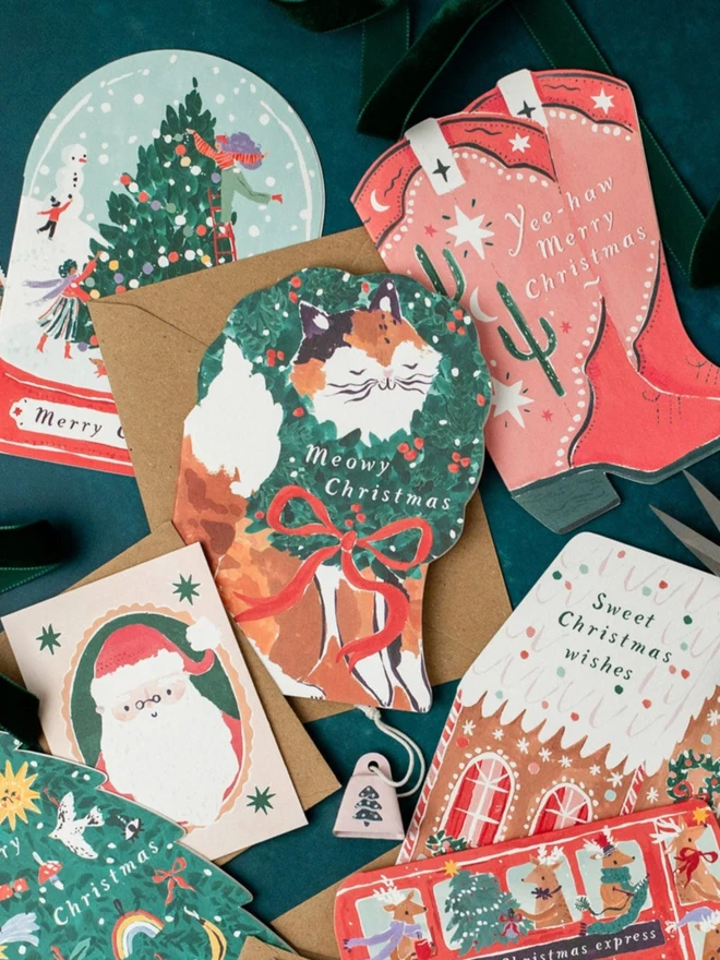 Snowglobe Christmas Card styled with other Sister Paper Co greeting cards