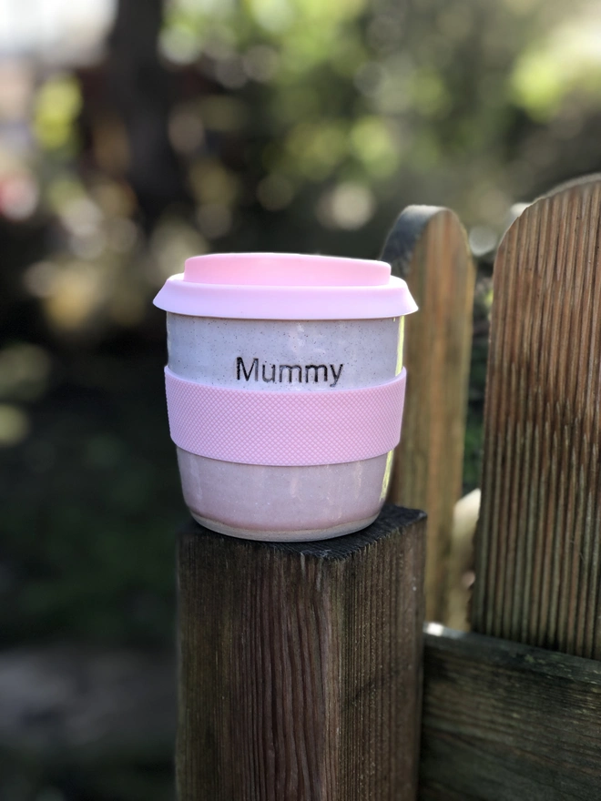 Short pink personalised travel mug
