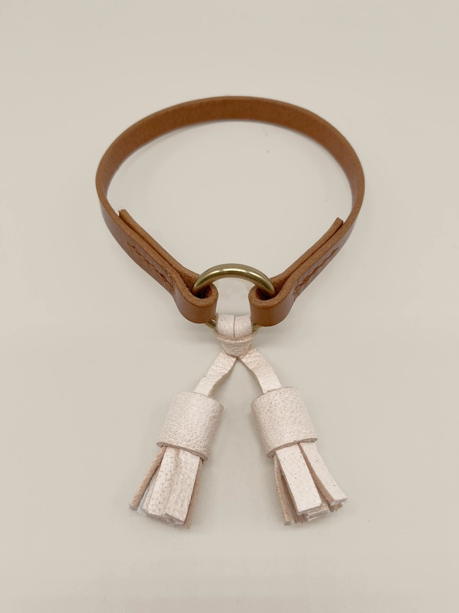 caramel house dog collar with moccasin tassels