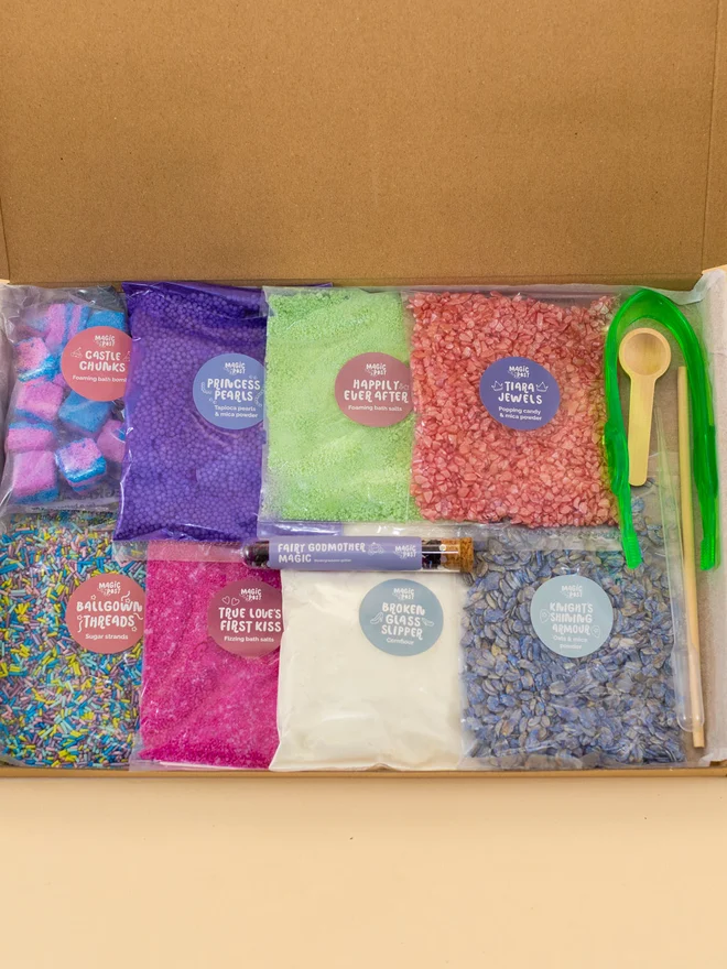 princess sensory potion kit. nine bags of various sensory materials placed into a cardboard box.