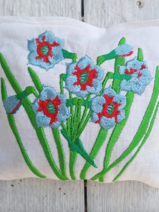 Mini Floral Lavender Sachet. Blue and red flowers on a small sachet.