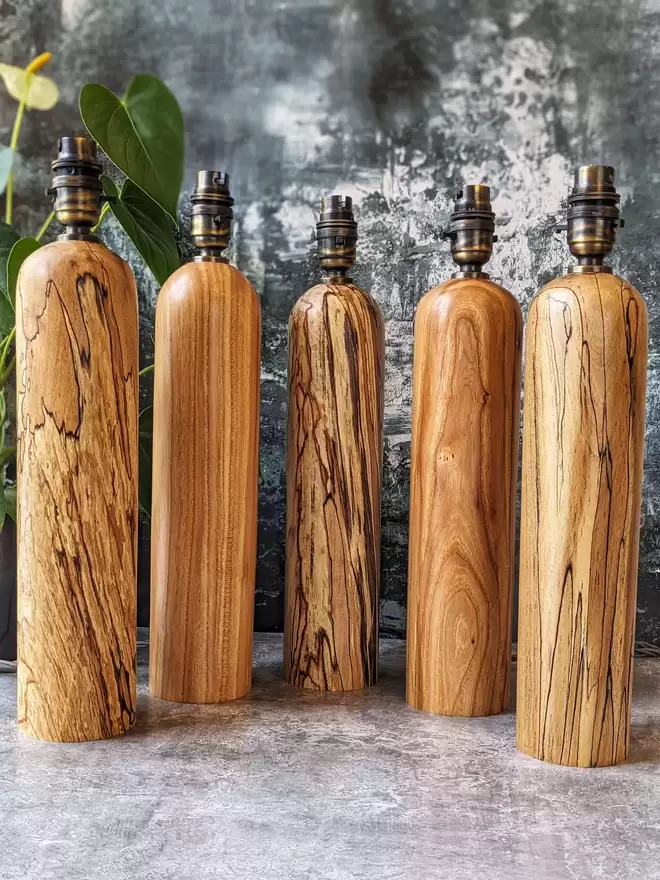 A collection of St Vincent Lamps by Something From The Turnery in Spalted Beech and Elm.