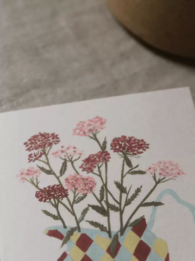 floral greetings card with yarrow in a harlequin jug.