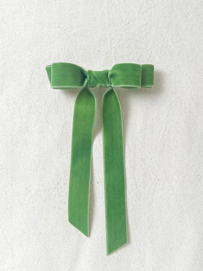 Girls velvet hair bow clip in green 