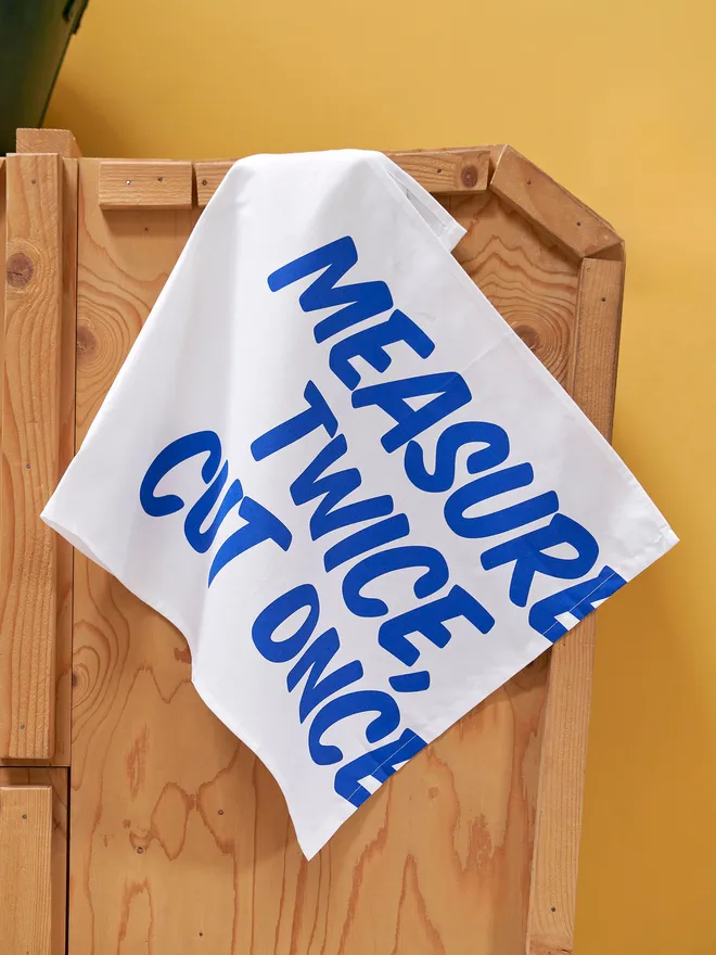 Measure twice cut once tea towel