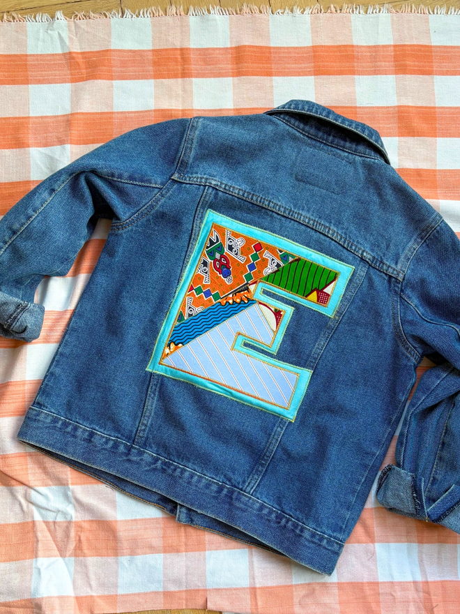 Monogrammed upcycled denim jacket