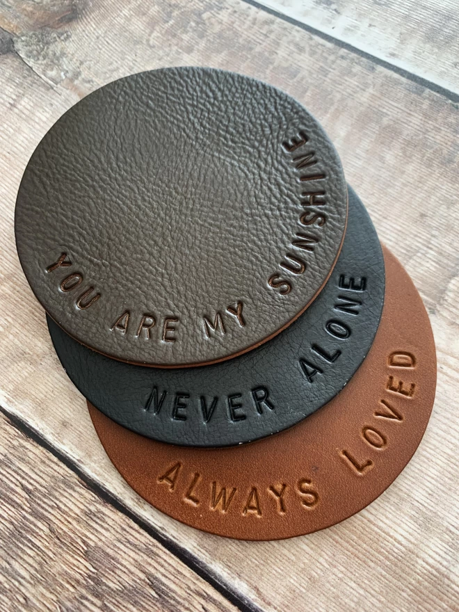 Handstamped leather coasters