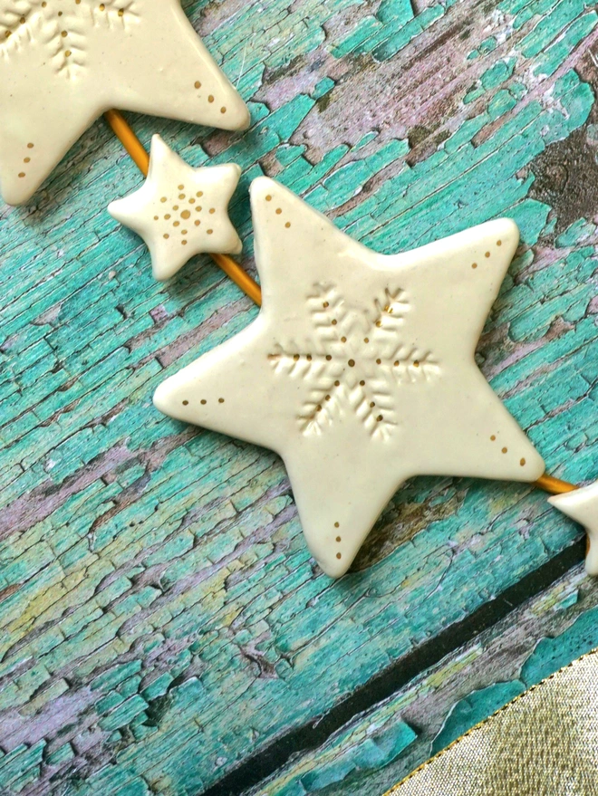 ceramic star wreath, christmas wreath, ceramic christmas wreath, star wreath, ceramic stars, christmas star decorations, christmas decor, christmas wall hangings, christmas unique home decor, Jenny Hopps Pottery