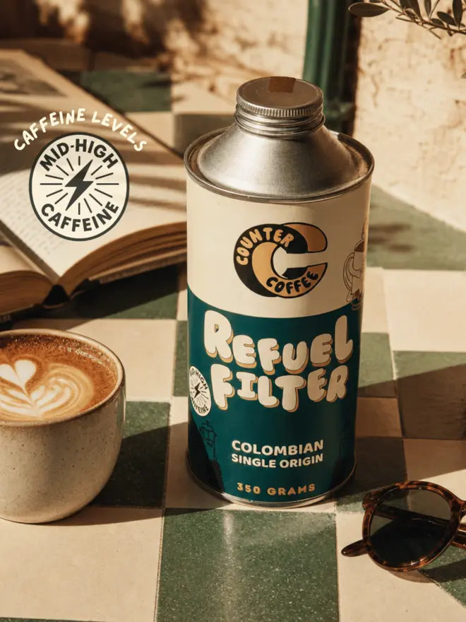 Refuel Filter. A tin of coffee beans from Counter Coffee.