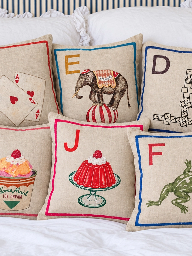 Group of personalised alphabet cushion covers