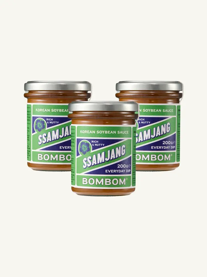 korean ssamjang sauce. three jars of soybean sauce with green labels.
