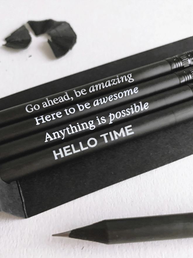 Close of of the four quotes printed onto pencils 