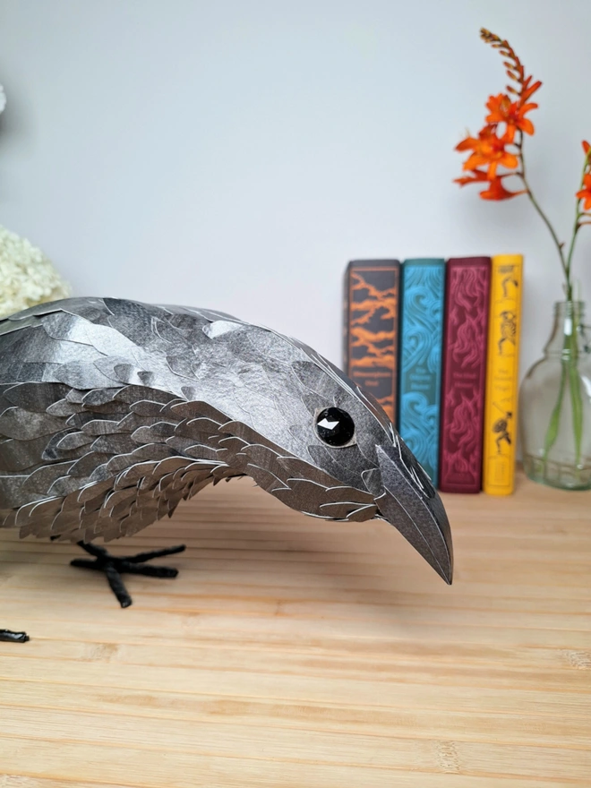handmade bird sculpture of a raven