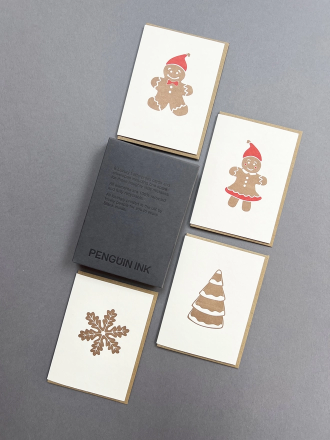 Back of a letterpress printed box together with four of the letterpress gingerbread cards