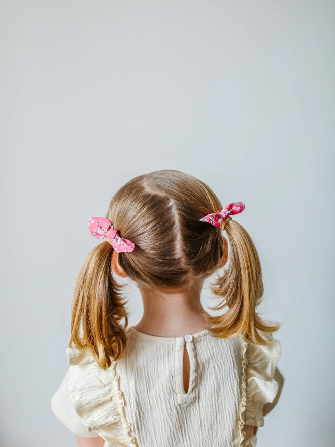 Girl with bunches and liberty hair bobbles