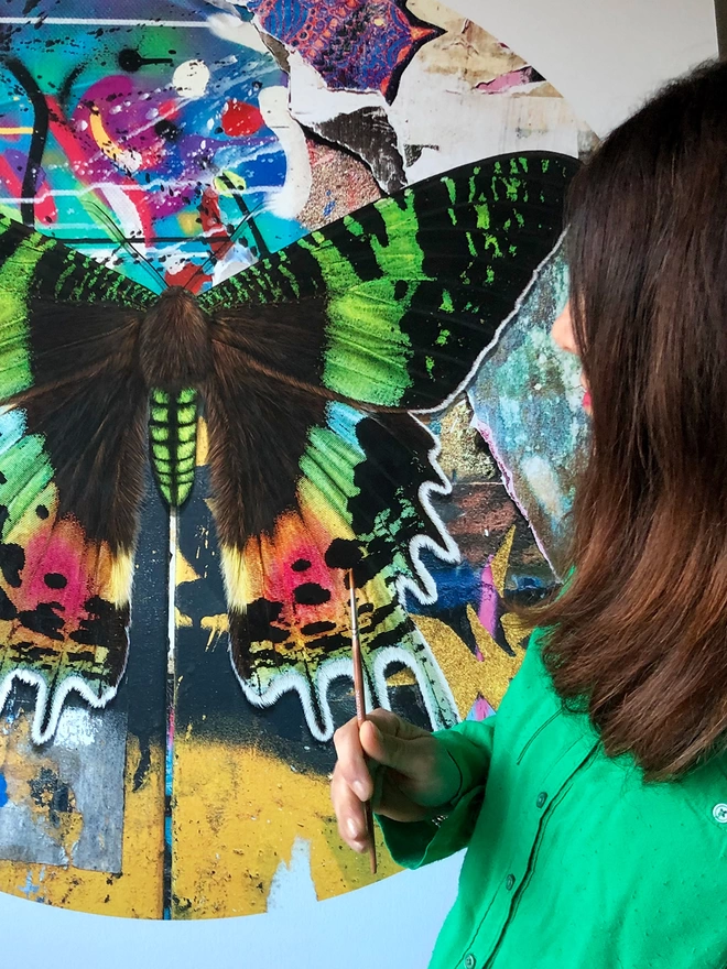 Hand finishing Sunset moth artwork