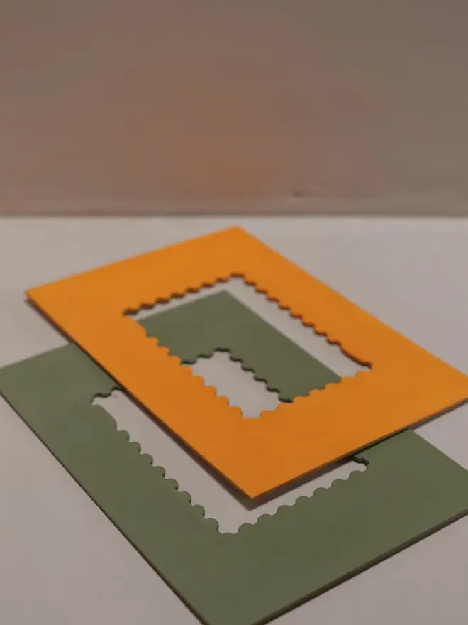 butterscotch coloured stamp-shaped mount