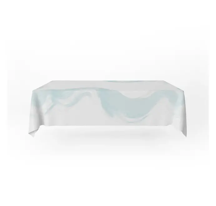 Imola Tablecloth. Light blue and white tablecloth with subtle abstract patterns. 